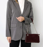 Handbag with studs